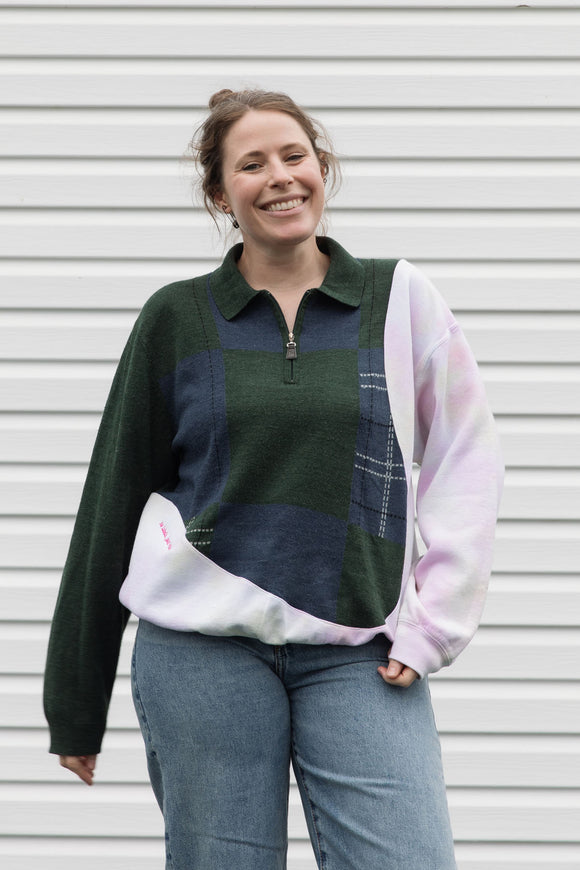 person wearing an upcycled sweater, featuring a green plaid knit sweater and pink tie dyed sweater sewn together, upcycled in canada