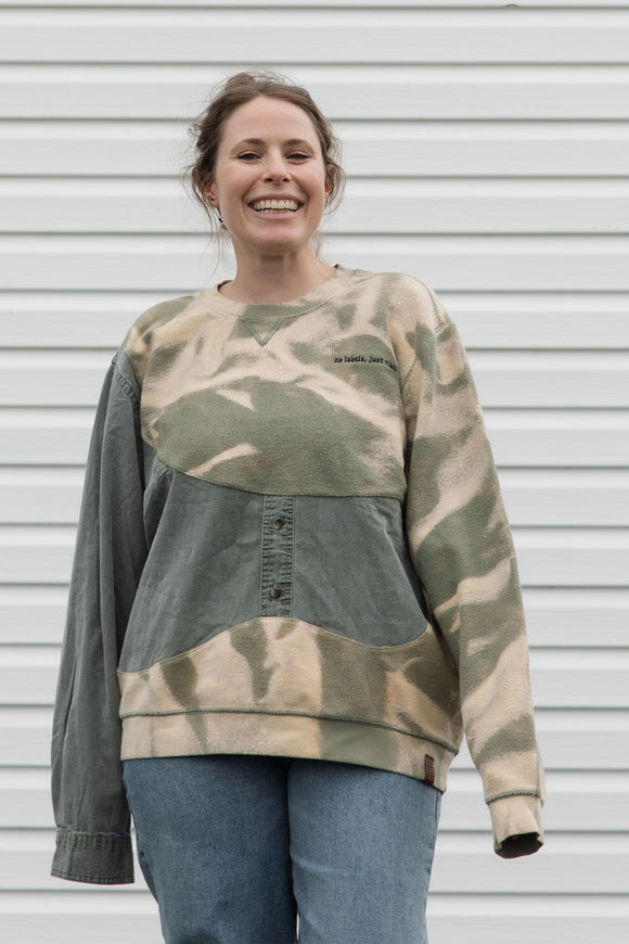 person wearing an unique upcycled pullover, repurposed in canada