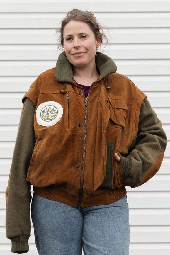 person wearing a wool & suede vintage jacket, upcycled in canada.