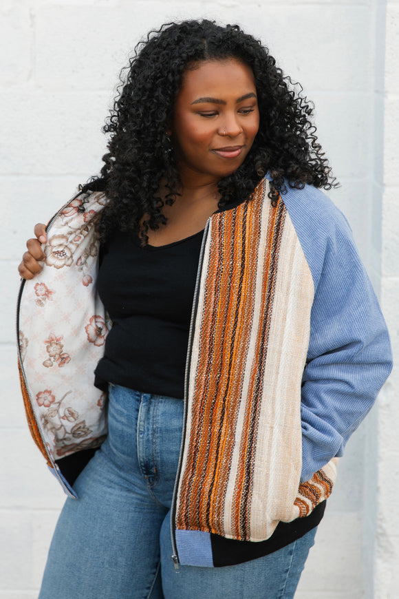 burnt orange striped bomber jacket, with blue corduroy sleeves, upcycled jacket, handmade in canada