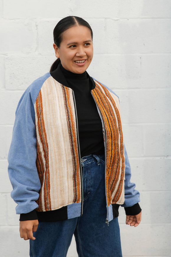 burnt orange striped bomber jacket, with blue corduroy sleeves, upcycled jacket, handmade in canada