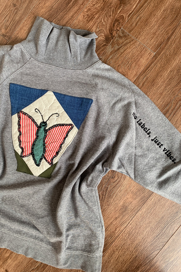 grey turtleneck with stunning quilted butterfly, repurposed and upcycled in caanda