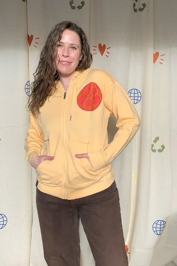upcycled yellow zip up with flower embroidery, repurposed in canada