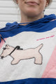 Person wearing a blue and pink hoodie with a dog design, upcycled in canada