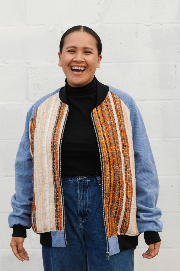 burnt orange striped bomber jacket, with blue corduroy sleeves, upcycled jacket, handmade in canada