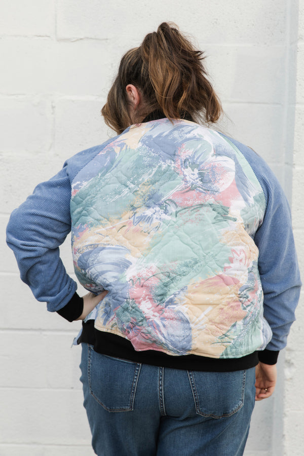 pastel abstract bomber jacket, upcycled clothing, blue corduroy sleeves, eco conscious clothing, handmade in canada