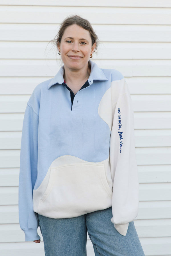 light blue collared polo and off-white sweater, upcycled in canada