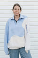 light blue collared polo and off-white sweater, upcycled in canada