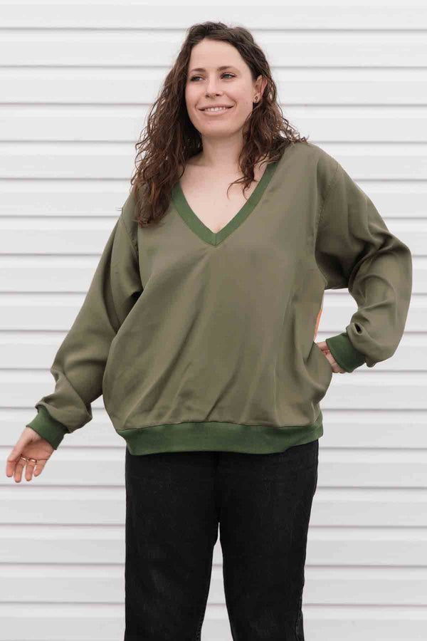 vneck blouse with pockets, upcycled fabric feature in the back
