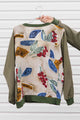 vneck blouse with pockets, upcycled fabric feature in the back