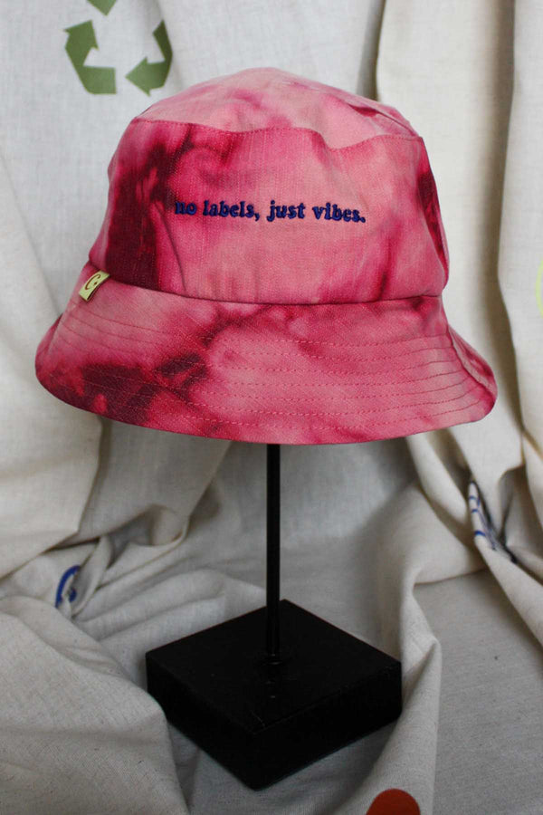 tie dyed and bleached bucket hats, reversible to neutral, made with repurposed denim and handmade in Canada