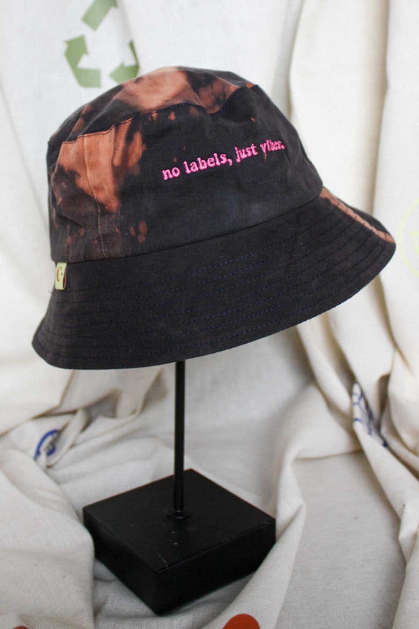 tie dyed and bleached bucket hats, reversible to neutral, made with repurposed denim and handmade in Canada