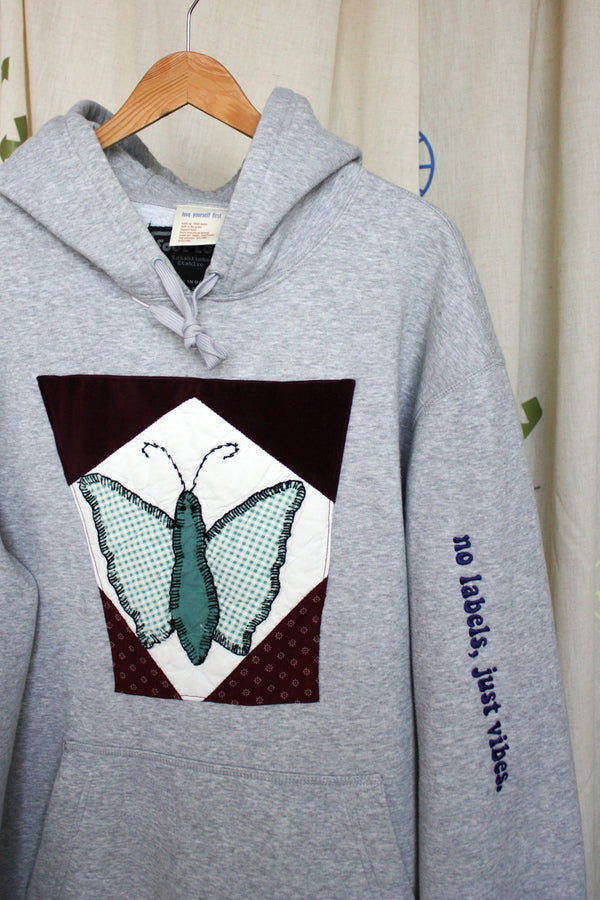ultra soft grey hoodie with butterfly quilted motif, handmade in canada, upcycled, no labels, just vibes