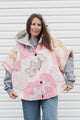 pink and white butterfly quilt turned poncho, featuring oversized hood, pockets and pretty purple buttons, repurposed in canada
