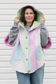 pink, green and blue pastel quilt turned poncho, with oversized hood, pockets and button up front, repurposed in canada