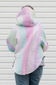 pink, green and blue pastel quilt turned poncho, with oversized hood, pockets and button up front, repurposed in canada