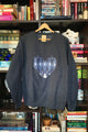 Gray sweatshirt with a blue heart design 
