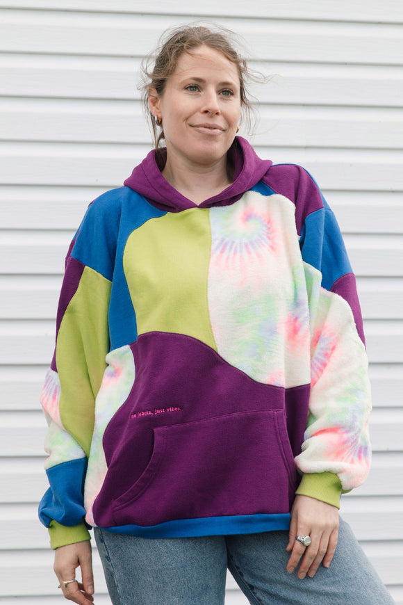 patchwork hoodie featuring blue, purple, lime green and tie dye