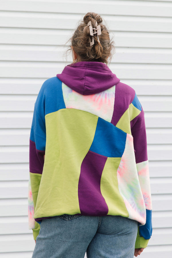 patchwork hoodie featuring blue, purple, lime green and tie dye