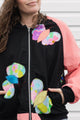 butterfly bomber jacket with pink cordruroy sleeves, upcycled and repurposed in canada