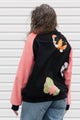 butterfly bomber jacket with pink cordruroy sleeves, upcycled and repurposed in canada
