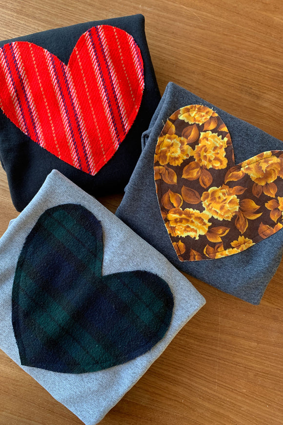 red striped heart sweater, yellow floral heart sweater & green plaid sweater