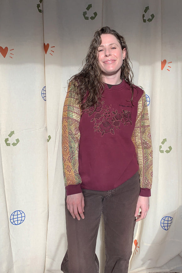 maroon norther reflections sweater with upcycled sleeves and floral detail, repurposed in canada