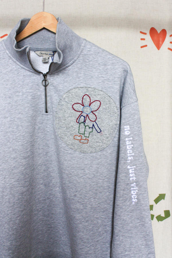 grey half zip sweater with floral embroidery detail, repurposed in canada