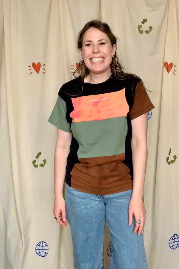 upcycled tshirt with black, orange, green and brown colours, repurposed in canada