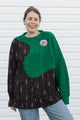 colour blocking sweater featuring bright green cable knit sweater and brown patterned shirt, upcycled in canada