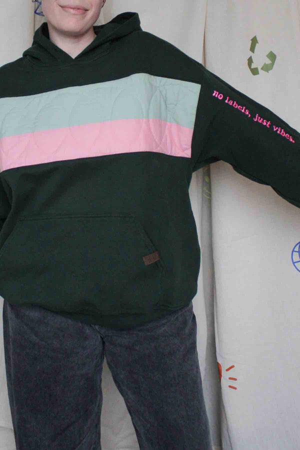 green hoodie, quilting motif, upcycled fashion
