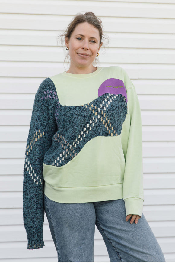 lime green sweater with purple detail and blue striped knit, upcycled in canada