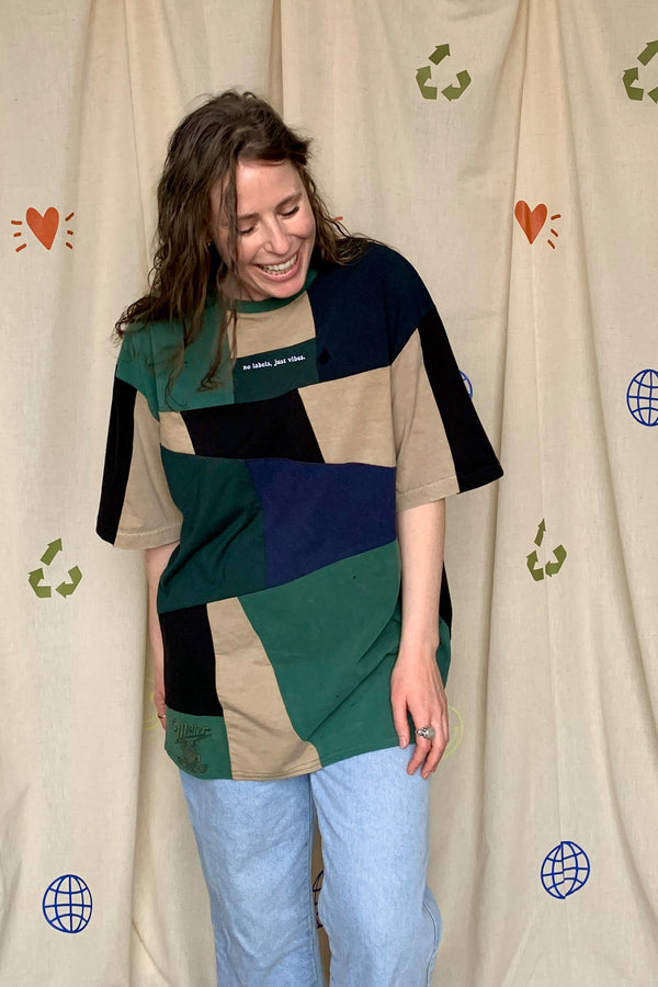 upcycled green, black & tan patchwork tee, featuring miller beer logo, repurposed in canada
