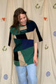 upcycled green, black & tan patchwork tee, featuring miller beer logo, repurposed in canada