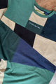 upcycled green, black & tan patchwork tee, featuring miller beer logo, repurposed in canada