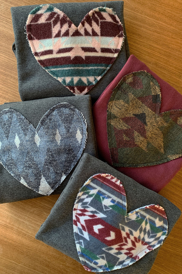 colourful patterned hearts on sweaters sewn in canada