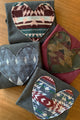 colourful patterned hearts on sweaters sewn in canada