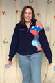 navy upcycled half zip with pops of coral, polka dots and tie dye, repurposed in caanda