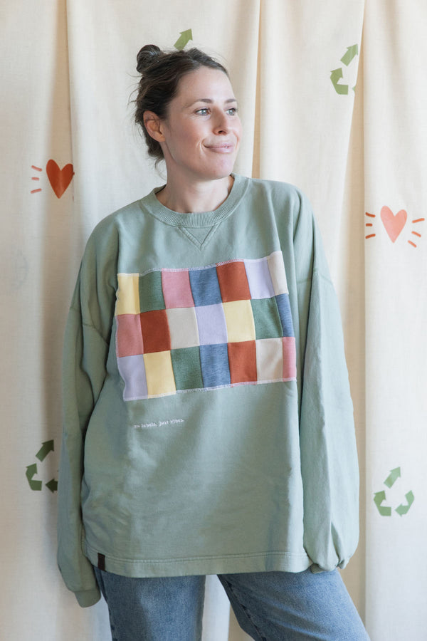 mint green crewneck with pastel pantone swatches, upcycled in canada