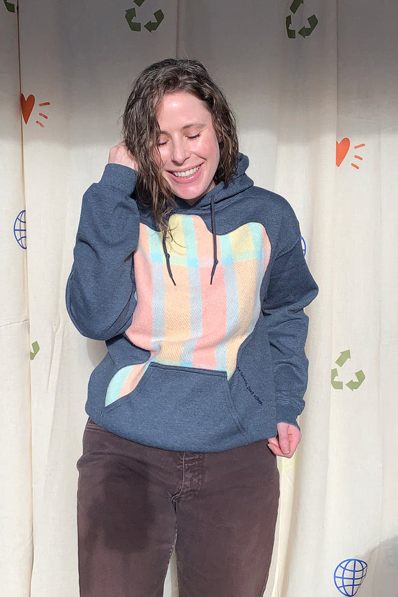 dark grey upcycled hoodie with pastel details repurposed in canada