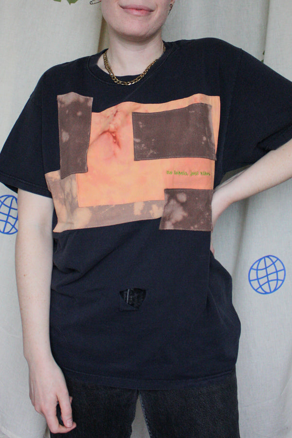 black tee with orange and brown squares, upcycled clothing, thrifted fashion, no labels, just vibes
