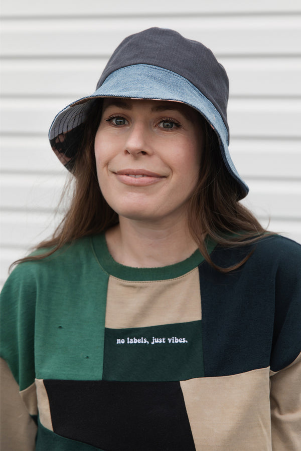 reversible patchwork bucket hat, colourful, one of a kind, each embroidered with 'no labels, just vibes.' made in canada
