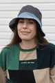 reversible patchwork bucket hat, colourful, one of a kind, each embroidered with 'no labels, just vibes.' made in canada