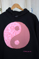 black hoodie with pink yin yang symbol, no labels, just vibes embroidery upcycled clothing, repurposed clothing, handmade in canada