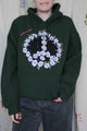 green hoodie with floral embroidered peace symbol, upcycled fashion