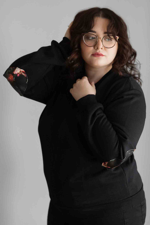 women wearing cotton oversized sweater with faux leather floral elbow patch. handmade in Ottawa