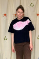 upcycled black t-shirt with pink bleached details, repurposed in canada