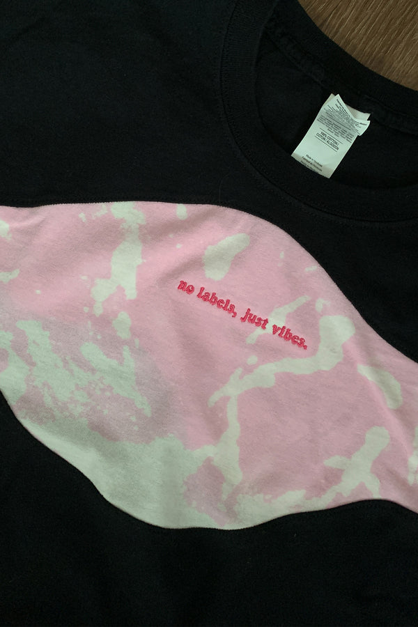 upcycled black t-shirt with pink bleached details, repurposed in canada