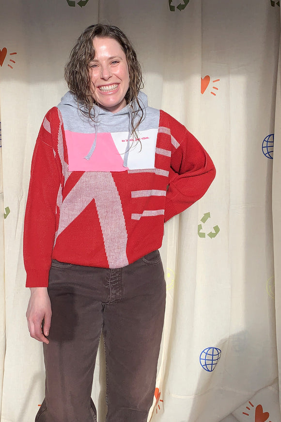 red sweater with grey hoodie and pops of pink upcycled in canada