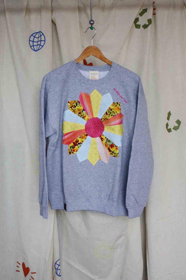 pinwheel quilted motif, upcycled sweater
